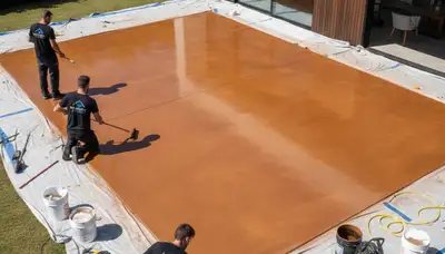 Professional concrete staining on residential patio in Colorado Springs, CO by expert house painters