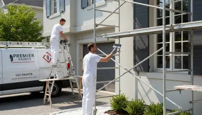 Professional shutter painting on a Colorado Springs home by expert exterior house painters