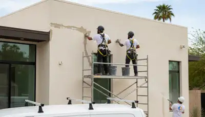 Stucco repair specialists restoring cracked exterior walls in Colorado Springs, CO homes
